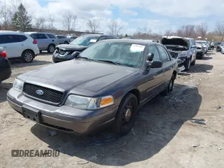 2007 Ford Police Interceptor z VIN 2FAFP71W97X155407, wystawiony jako IAAI lot #41881583 z przebiegiem Nie podano mil oraz . Historia ofert i sprzedaży dostępna na DreamBid. Obrazek 2.