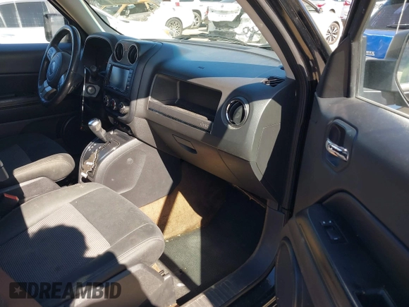 2013 Jeep Patriot Latitude with VIN 1C4NJPFA5DD230031, listed as a IAAI auction lot 41641768 with 153,910 mi miles. Bid and sale history available at carsss.com. Image 5.