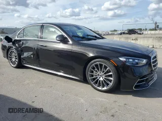 2024 Mercedes-Benz S 580e with VIN W1K6G6KB9RA287889, listed as a Copart auction lot 79701824 with 165 mi miles and Salvage Title. Bid and sale history available at DreamBid. Image 4.