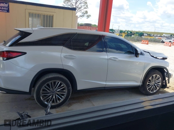 2022 Lexus RX 350L Luxury z VIN JTJJZKEA8N2026796, wystawiony jako IAAI lot #42331201 z przebiegiem 46 865 mil mil oraz . Historia ofert i sprzedaży dostępna na DreamBid. Obrazek 14.