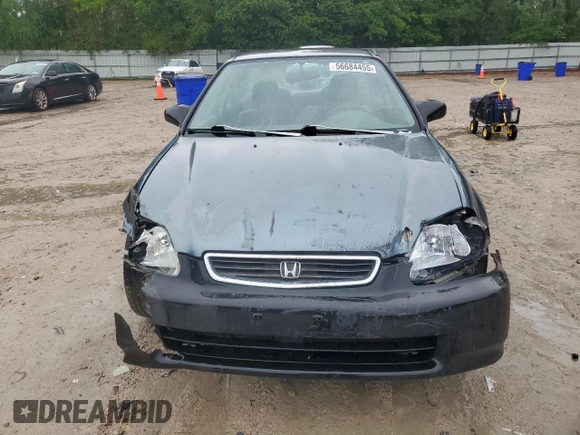 1997 Honda Civic LX z VIN 2HGEJ6676VH507855, wystawiony jako Copart lot #56684455 z przebiegiem 185 498 mil mil oraz Szkoda całkowita • Salvage title. Historia ofert i sprzedaży dostępna na DreamBid. Obrazek 5.