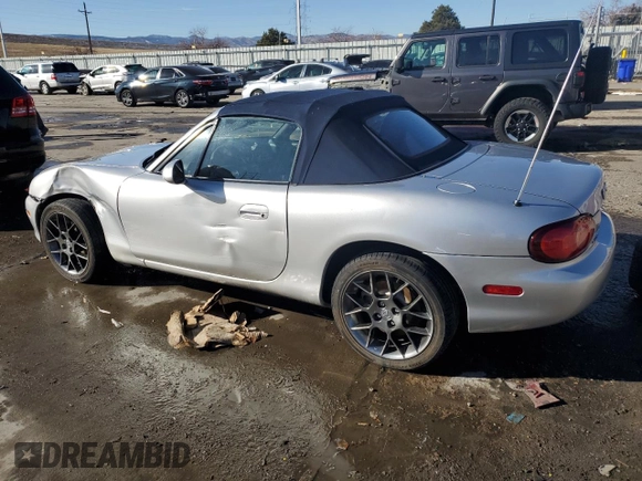 2004 Mazda MX-5 Miata LS with VIN JM1NB353640402308, listed as a Copart auction lot 84568244 with 50,287 mi miles and Salvage title. Bid and sale history available at DreamBid. Image 2.