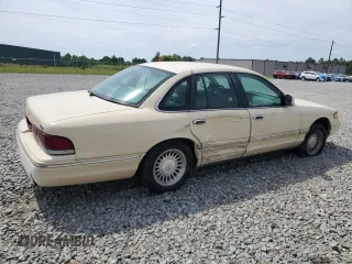 1996 Ford Crown Victoria LX с VIN 2FALP74W1TX192976, выставлен на аукционе Copart как лот 56104895 с пробегом 144 011 миль миль и Списание • Salvage title. История ставок и продаж доступна на DreamBid. Изображение 3.