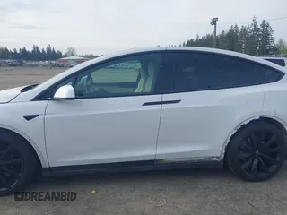 2022 Tesla Model X with VIN 7SAXCBE54NF363113, listed as a IAAI auction lot 41978397 with 27,166 mi miles. Bid and sale history available at carsss.com. Image 15.