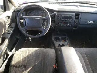 2004 Dodge Dakota Sport z VIN 1D7HG38N64S688604, wystawiony jako Copart lot #79811934 z przebiegiem 160 377 mil mil oraz Szkoda całkowita • Salvage title. Historia ofert i sprzedaży dostępna na DreamBid. Obrazek 8.