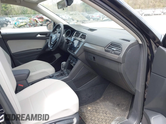 2019 Volkswagen Tiguan SE with VIN 3VV2B7AX7KM174382, listed as a IAAI auction lot 42147584 with 64,460 mi miles and . Bid and sale history available at DreamBid. Image 5.