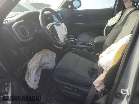 2021 Toyota Tacoma SR with VIN 3TMCZ5AN0MM395357, listed as a Copart auction lot 87086684 with 48,664 mi miles and Salvage title. Bid and sale history available at DreamBid. Image 7.