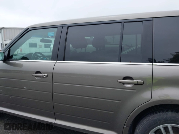 2014 Ford Flex SEL z VIN 2FMGK5C88EBD10549, wystawiony jako IAAI lot #42349426 z przebiegiem 123 903 mil mil oraz . Historia ofert i sprzedaży dostępna na DreamBid. Obrazek 14.