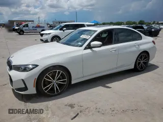 2023 BMW 3 Series 330i with VIN 3MW69FF02P8C80382, listed as a Copart auction lot 62414305 with 26,647 mi miles and Salvage title. Bid and sale history available at DreamBid. Image 1.