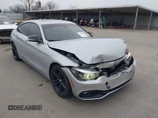 2018 BMW 4 Series 440i with VIN WBA4J5C57JBF07924, listed as a IAAI auction lot 41595682 with 75,121 mi miles and . Bid and sale history available at carsss.com. Image 1.