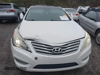 2013 Hyundai Azera with VIN KMHFH4JG0DA216691, listed as a IAAI auction lot 41704694 with 200,228 mi miles and . Bid and sale history available at DreamBid. Image 6.