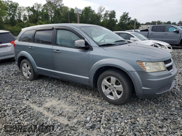 2009 Dodge Journey SXT with VIN 3D4GG57V59T582639, listed as a Copart auction lot 54008275 with 185,017 mi miles and Clean Title. Bid and sale history available at carsss.com. Image 4.