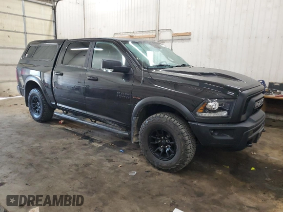 2018 Ram 1500 Rebel with VIN 1C6RR7YT3JS128802, listed as a Copart auction lot 50512365 with 98,106 mi miles and Salvage title. Bid and sale history available at DreamBid. Image 4.