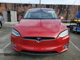 2016 Tesla Model X 70D with VIN 5YJXCAE28GF002399, listed as a Copart auction lot 50884225 with 73,113 mi miles and Salvage Title. Bid and sale history available at DreamBid. Image 5.