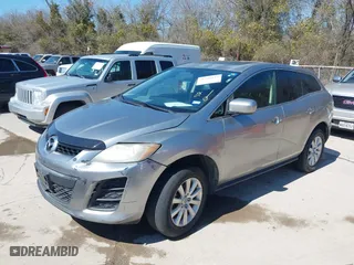 2010 Mazda CX-7 SV with VIN JM3ER2W51A0348537, listed as a IAAI auction lot 41766125 with 239,282 mi miles. Bid and sale history available at carsss.com. Image 2.