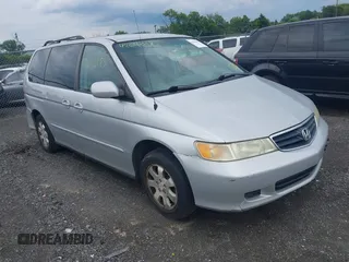 2003 Honda Odyssey EX-L with VIN 5FNRL18963B037230, listed as a IAAI auction lot 42640185 with 307,898 mi miles and . Bid and sale history available at DreamBid. Image 1.