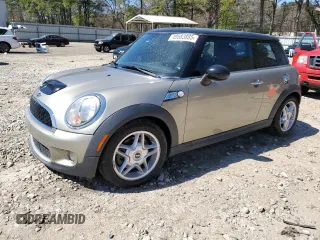 2009 MINI Hardtop S with VIN WMWMF73529TW86602, listed as a Copart auction lot 49583885 with 109,310 mi miles and Salvage Title. Bid and sale history available at DreamBid. Image 1.