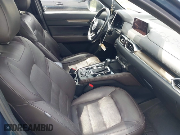 2019 Mazda CX-5 Signature with VIN JM3KFBEY1K0512880, listed as a IAAI auction lot 42036904 with 92,650 mi miles. Bid and sale history available at carsss.com. Image 5.