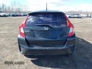 2015 Honda Fit LX z VIN 3HGGK5H51FM775176, wystawiony jako IAAI lot #41690648 z przebiegiem 49 979 mil mil oraz . Historia ofert i sprzedaży dostępna na DreamBid. Obrazek 16.