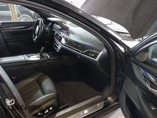 2020 BMW 7 Series 750i xDrive with VIN WBA7U2C02LGJ59475, listed as a IAAI auction lot 41975021 with 52,818 mi miles and . Bid and sale history available at carsss.com. Image 5.