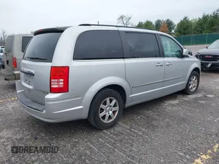 2010 Chrysler Town & Country Touring z VIN 2A4RR5D12AR265985, wystawiony jako IAAI lot #41970445 z przebiegiem 125 635 mil mil oraz . Historia ofert i sprzedaży dostępna na DreamBid. Obrazek 4.