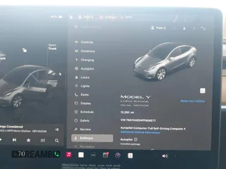 2023 Tesla Model Y Long Range with VIN 7SAYGAEE4PF906577, listed as a IAAI auction lot 42174987 with 13,260 mi miles and . Bid and sale history available at DreamBid. Image 7.