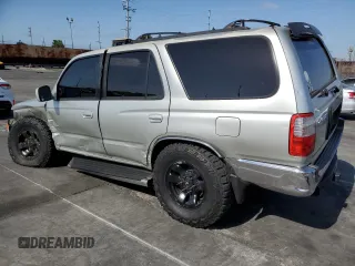 2000 Toyota 4Runner SR5 z VIN JT3GN86R4Y0159902, wystawiony jako Copart lot #57287845 z przebiegiem 174 742 mil mil oraz Szkoda całkowita • Salvage title. Historia ofert i sprzedaży dostępna na DreamBid. Obrazek 2.