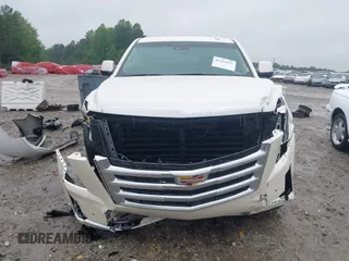 2015 Cadillac Escalade ESV Premium z VIN 1GYS4TKJ6FR708255, wystawiony jako IAAI lot #42244621 z przebiegiem 31 407 mil mil oraz . Historia ofert i sprzedaży dostępna na DreamBid. Obrazek 13.