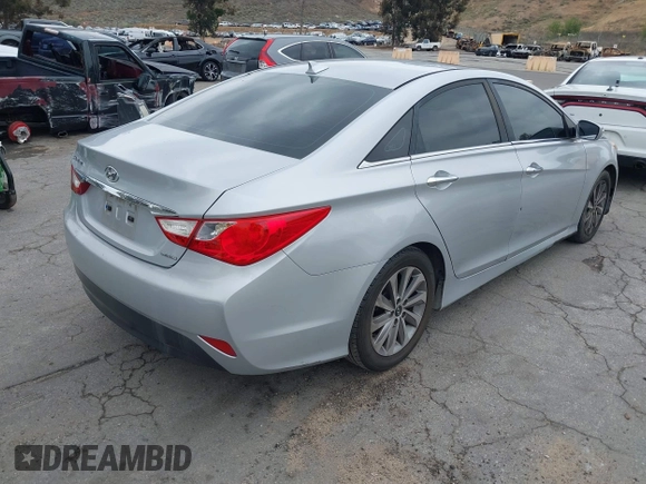 2014 Hyundai Sonata SE with VIN 5NPEC4AC3EH882711, listed as a IAAI auction lot 42192424 with 189,279 mi miles and . Bid and sale history available at DreamBid. Image 4.