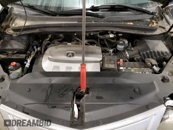 2010 Acura MDX z VIN 2HNYD2H20AH531957, wystawiony jako Copart lot #42033425 z przebiegiem 147 404 mil mil oraz Szkoda całkowita • Salvage title. Historia ofert i sprzedaży dostępna na DreamBid. Obrazek 14.