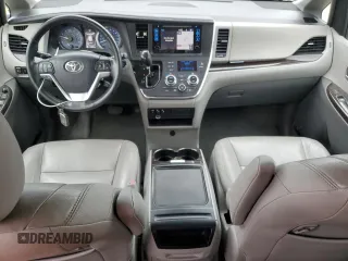 2015 Toyota Sienna XLE с VIN 5TDYK3DC6FS561960, выставлен на аукционе Copart как лот 59607355 с пробегом 110 593 миль миль и Списание • Salvage title. История ставок и продаж доступна на DreamBid. Изображение 8.