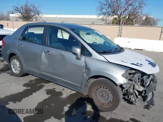 2010 Nissan Versa 1.8 S with VIN 3N1BC1AP2AL450998, listed as a IAAI auction lot 41433147 with 88,535 mi miles. Bid and sale history available at carsss.com. Image 1.