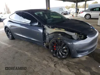 2021 Tesla Model 3 Performance with VIN 5YJ3E1EC1MF074350, listed as a Copart auction lot 47434275 with 63,319 mi miles and Salvage Title. Bid and sale history available at DreamBid. Image 4.