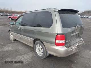 2003 Kia Sedona LX with VIN KNDUP131636378834, listed as a IAAI auction lot 42016556 with 88,751 mi miles and . Bid and sale history available at DreamBid. Image 3.
