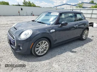 2015 MINI Hardtop S with VIN WMWXP7C58F2A60616, listed as a Copart auction lot 65693685 with 126,303 mi miles and Salvage title. Bid and sale history available at DreamBid. Image 1.