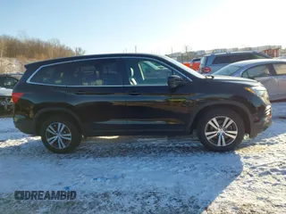 2016 Honda Pilot EX-L with VIN 5FNYF6H7XGB115951, listed as a IAAI auction lot 41642756 with 101,688 mi miles. Bid and sale history available at carsss.com. Image 13.