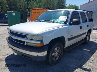 2001 Chevrolet Tahoe LT z VIN 1GNEC13TX1R172937, wystawiony jako IAAI lot #42199690 z przebiegiem 256 923 mil mil oraz . Historia ofert i sprzedaży dostępna na DreamBid. Obrazek 2.