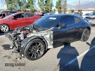 2017 Toyota 86 with VIN JF1ZNAA13H9706267, listed as a Copart auction lot 87099494 with 91,137 mi miles and Salvage Title. Bid and sale history available at carsss.com. Image 1.