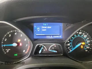 2012 Ford Focus SE with VIN 1FAHP3F20CL451852, listed as a Copart auction lot 60310765 with 150,305 mi miles and Salvage title. Bid and sale history available at DreamBid. Image 9.