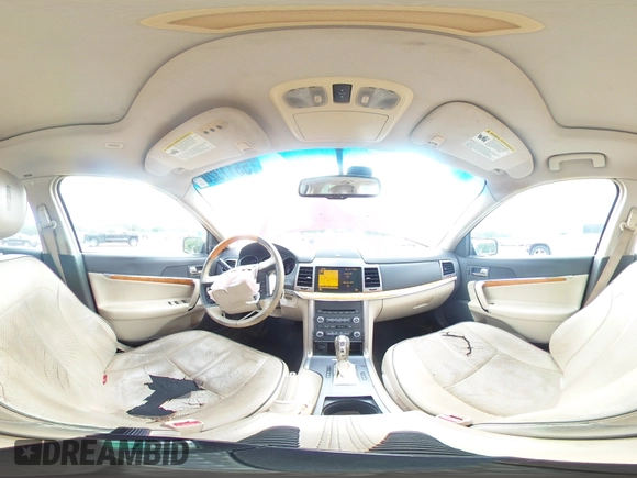 2010 Lincoln MKZ z VIN 3LNHL2GC7AR650494, wystawiony jako Copart lot #55113205 z przebiegiem 187 116 mil mil oraz Szkoda całkowita • Salvage title. Historia ofert i sprzedaży dostępna na DreamBid. Obrazek 14.