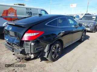 2013 Honda Crosstour EX-L z VIN 5J6TF2H59DL005896, wystawiony jako IAAI lot #41207731 z przebiegiem 172 952 mil mil oraz . Historia ofert i sprzedaży dostępna na DreamBid. Obrazek 4.