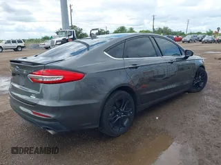 2019 Ford Fusion SE with VIN 3FA6P0HD3KR171749, listed as a IAAI auction lot 40298552 with 70,784 mi miles. Bid and sale history available at carsss.com. Image 4.