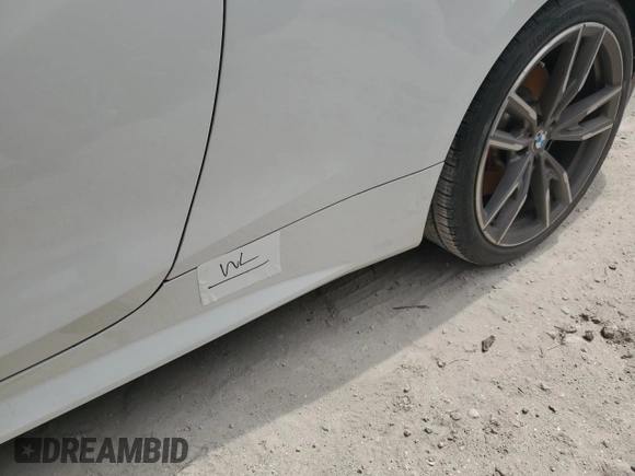 2022 BMW 4 Series M440i with VIN WBA53AT06NCK03623, listed as a Copart auction lot 76490964 with Not provided miles and Salvage title. Bid and sale history available at DreamBid. Image 12.