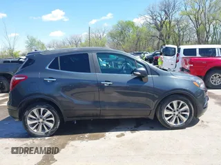 2017 Buick Encore Essence with VIN KL4CJCSB4HB012026, listed as a IAAI auction lot 41974604 with 139,467 mi miles and . Bid and sale history available at carsss.com. Image 13.