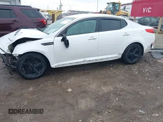 2015 Kia Optima LX with VIN KNAGM4A72F5654352, listed as a IAAI auction lot 41706156 with 119,000 mi miles. Bid and sale history available at carsss.com. Image 15.