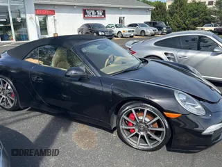 2013 Porsche 911 Carrera S with VIN WP0CB2A97DS154165, listed as a Copart auction lot 56958415 with 99,999 mi miles and Salvage Title. Bid and sale history available at DreamBid. Image 1.