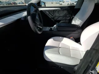 2023 Tesla Model Y Long Range with VIN 7SAYGDEE5PA100116, listed as a Copart auction lot 45713965 with 32,005 mi miles and Salvage Title. Bid and sale history available at carsss.com. Image 7.