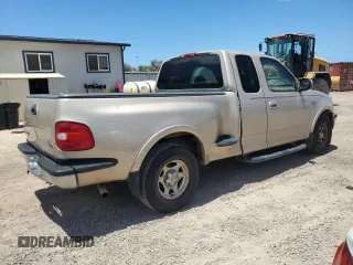 1998 Ford F-150 XL with VIN 1FTRX07L6WKB62554, listed as a Copart auction lot 67597854 with 100,528 mi miles and Salvage Title. Bid and sale history available at carsss.com. Image 3.