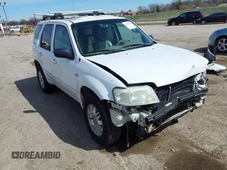2005 Mercury Mariner Luxury z VIN 4M2CU57155DJ30878, wystawiony jako IAAI lot #41870029 z przebiegiem 191 010 mil mil oraz . Historia ofert i sprzedaży dostępna na DreamBid. Obrazek 1.