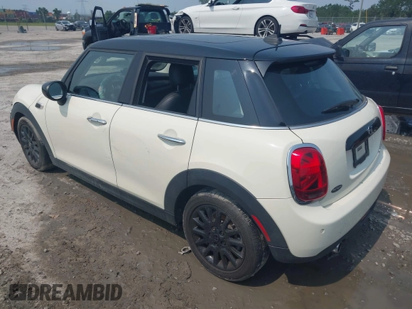 2020 MINI Hardtop 4 Door Cooper with VIN WMWXU7C01L2M54710, listed as a IAAI auction lot 42385956 with 55,714 mi miles and . Bid and sale history available at DreamBid. Image 3.